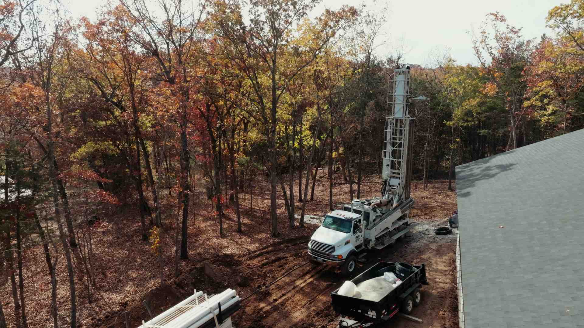 Geothermal ground loop being installed, showcasing an advanced heating source - radiant floor heating contractors westphalia
