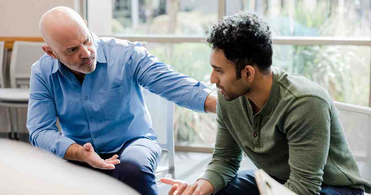 Family and professional counselor in calm setting - Addiction crisis intervention