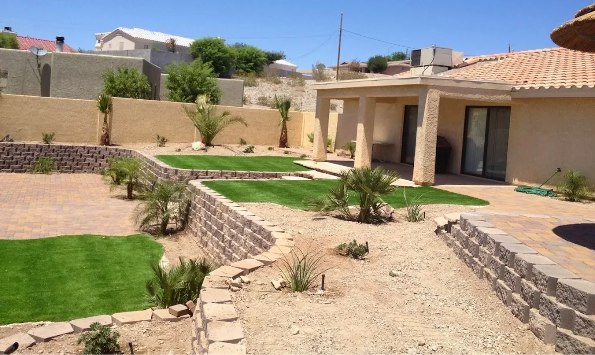 finished desert landscape design with pavers and desert-hardy plants in Lake Havasu City