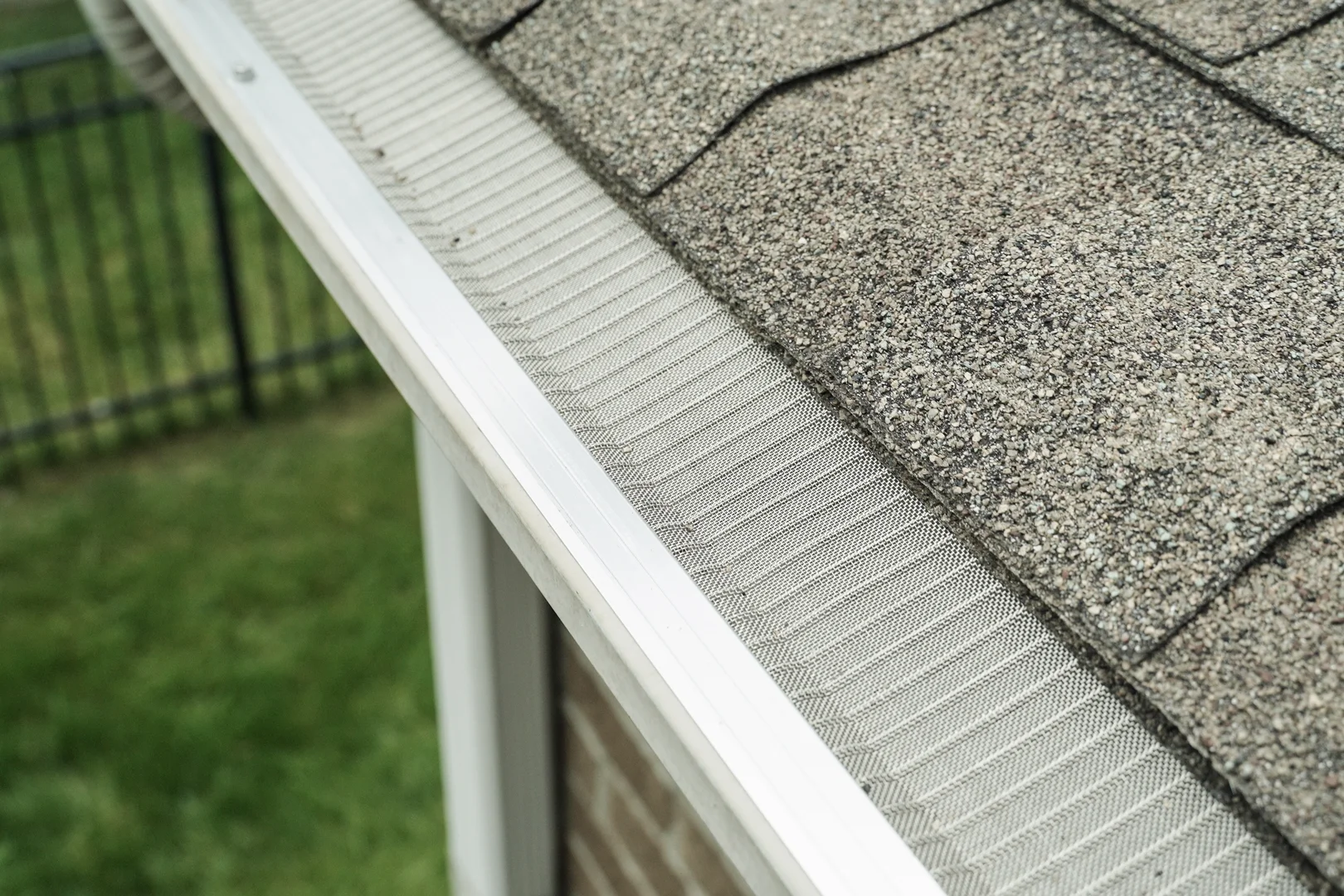 Infographic showing how a gutter downspout guard blocks debris and allows water flow - gutter downspout guard infographic Infographic showing how a gutter downspout guard blocks debris and allows water flow - gutter downspout guard infographic