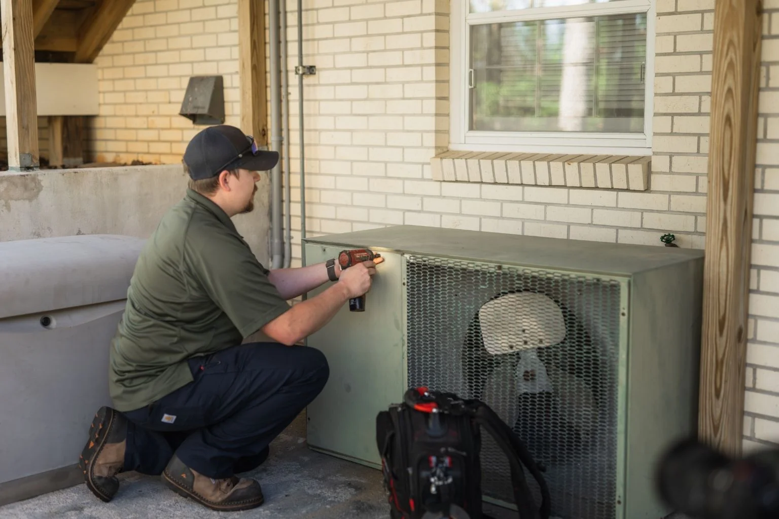 Old AC unit condenser replacement for improved efficiency and lifespan.