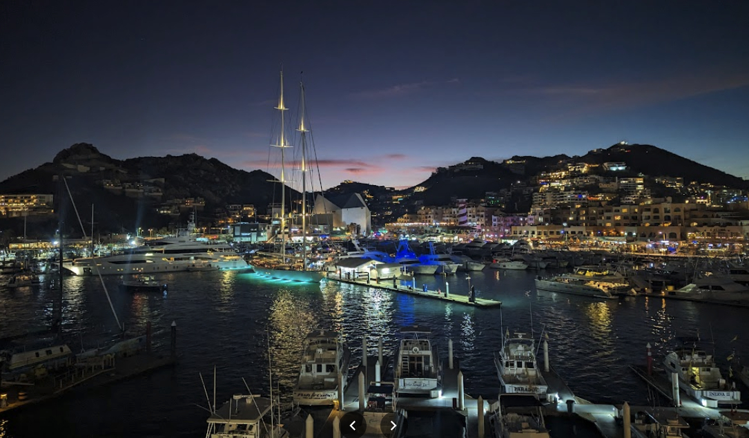 Corazón Beach Club with people enjoying the sun and music - beachfront hotels cabo san lucas