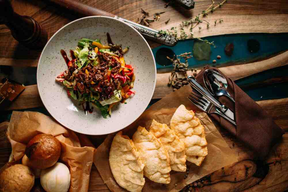 Mobile phone screen showing easy online booking interface for Cabo restaurant transportation with vehicle options and pricing - Cabo Restaurant Transportation Mobile phone screen showing easy online booking interface for Cabo restaurant transportation with vehicle options and pricing - Cabo Restaurant Transportation