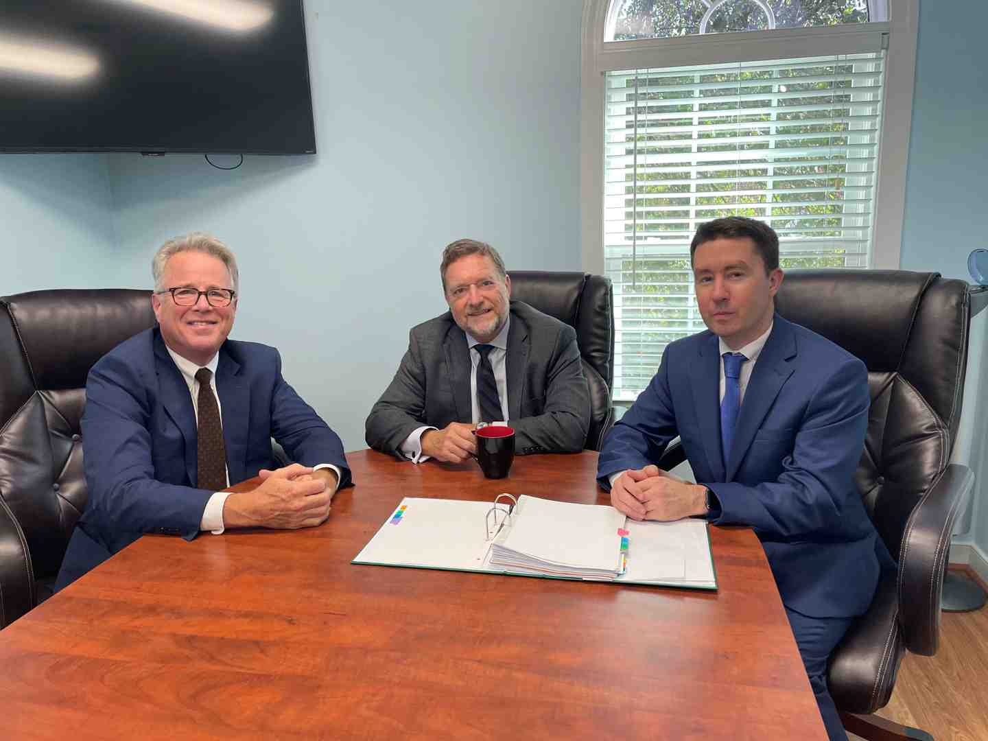 Lawyer consulting with a client in an office setting - Personal injury Northern Virginia