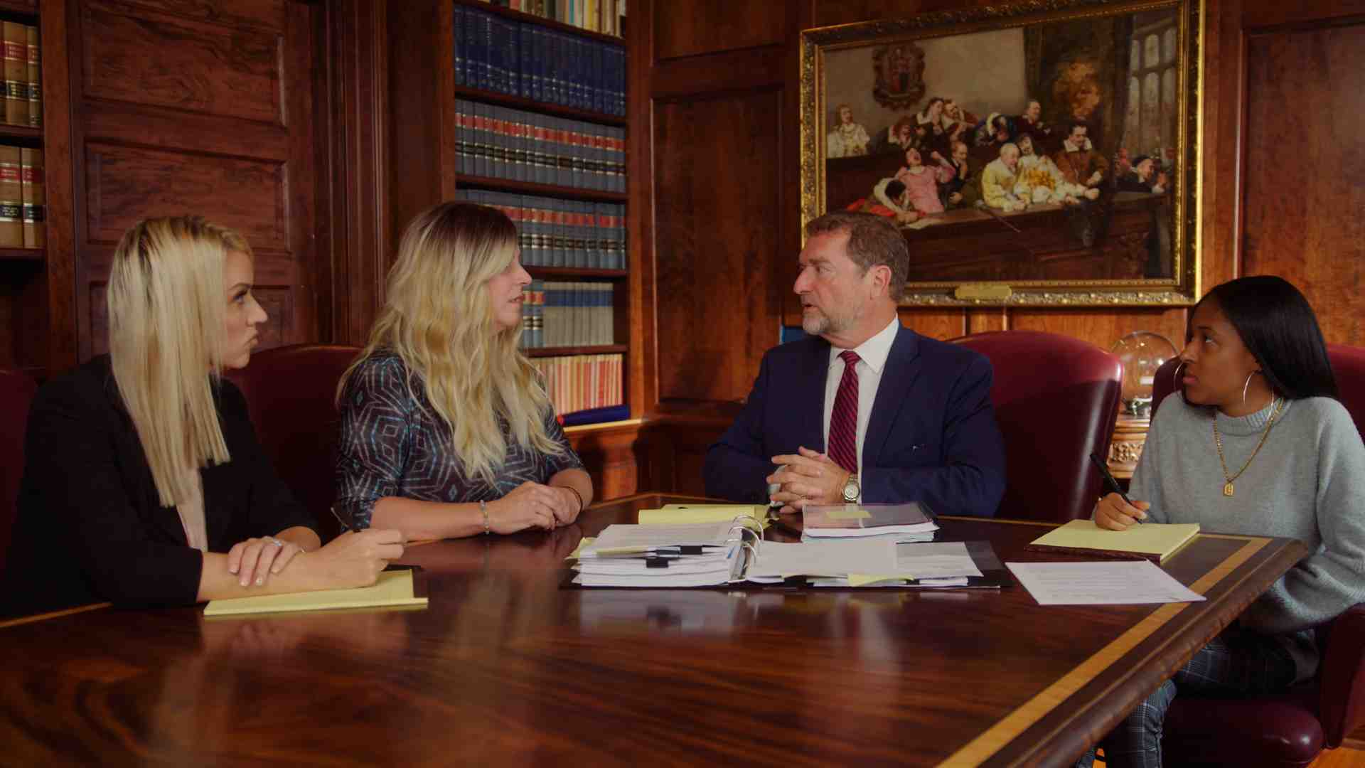 Lawyer meeting with client in office - injury lawyer richmond va