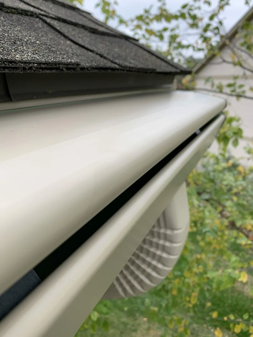 Close-up of the K-Guard leaf-free gutter system installed along a roofline Close-up of the K-Guard leaf-free gutter system installed along a roofline