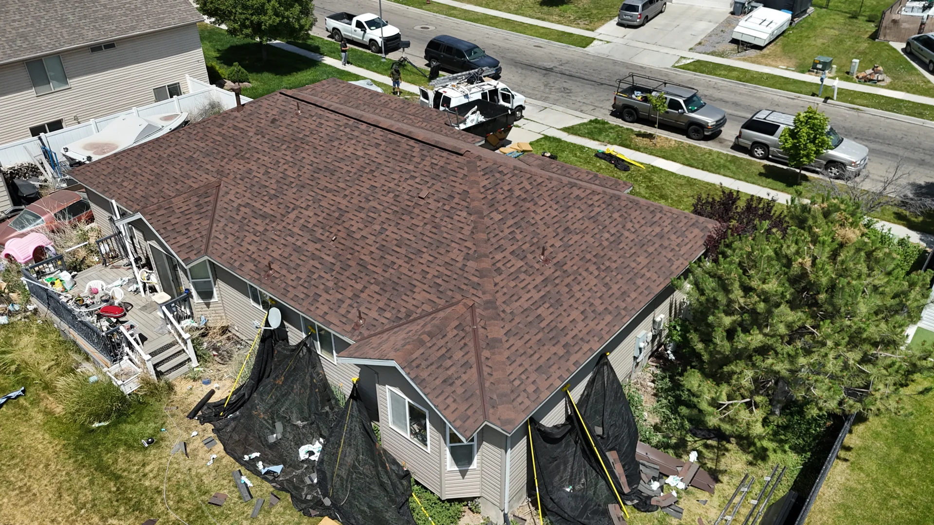 Close up of curling shingles and heavy granule loss on a South Jordan roof - roof repair South Jordan Close up of curling shingles and heavy granule loss on a South Jordan roof - roof repair South Jordan