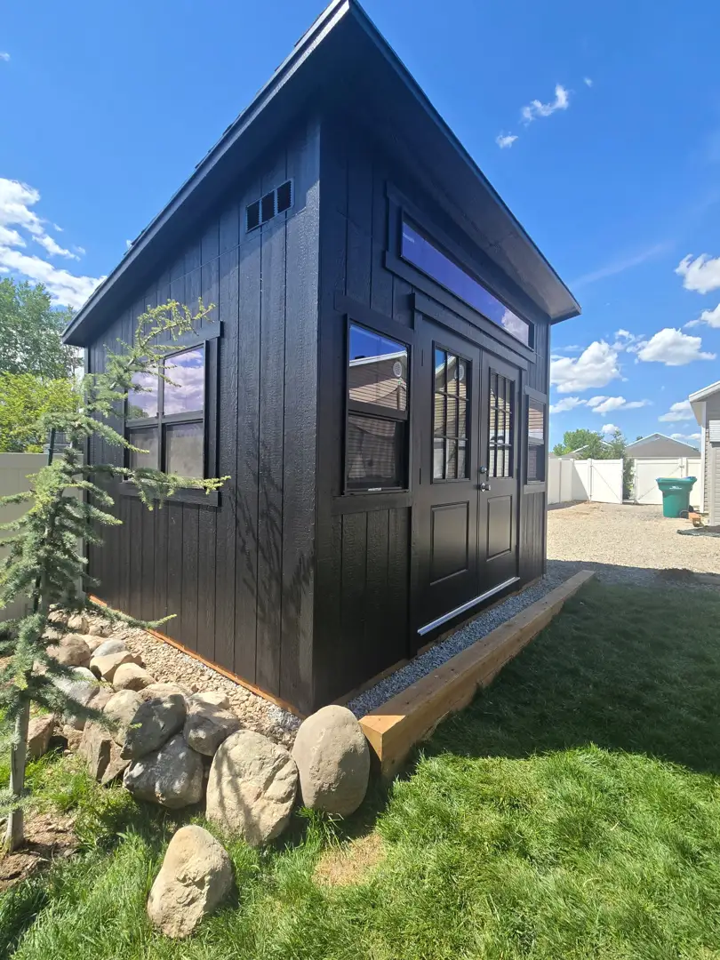 Modern Black Lean-To Cool Shed Designs Contemporary black lean-to backyard shed with large windows and glass doors highlighting cool shed designs for stylish outdoor workspaces.