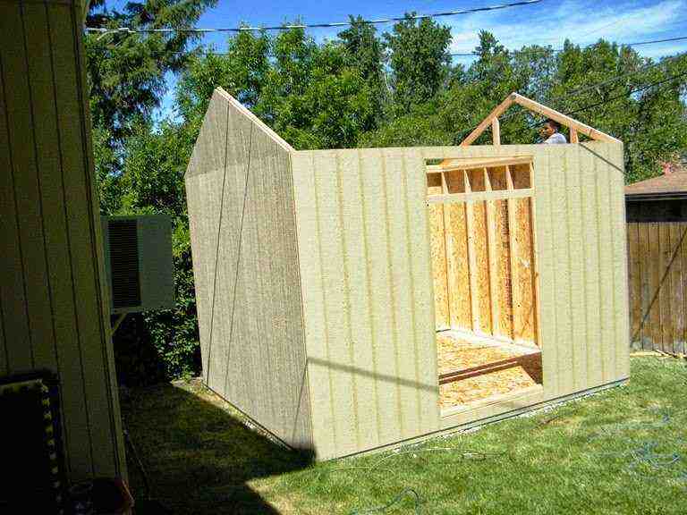 Constructing the frame of a DIY storage shed, an essential step in building your own storage shed project.