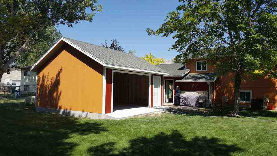 A newly built detached garage by Wright's Shed Co. featuring quality construction and design.