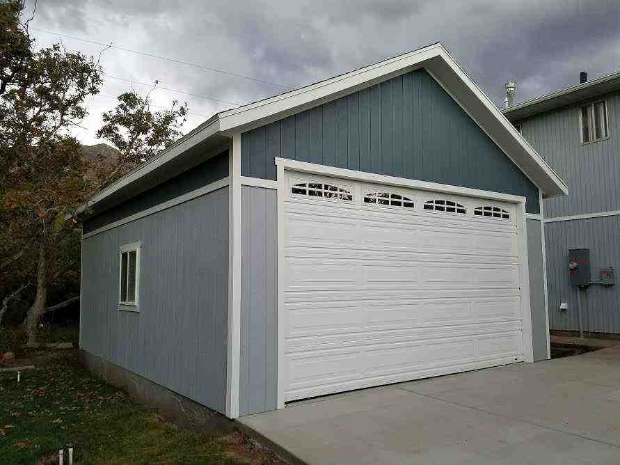 A custom-built detached garage in Layton, showcasing Wright's Shed Co.'s quality construction.
