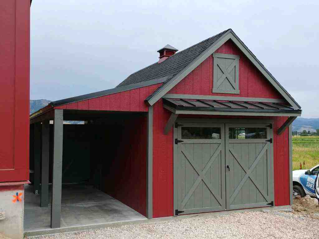 Red structure with barn doors and overhang, combining functional carports and sheds for storage and vehicles.