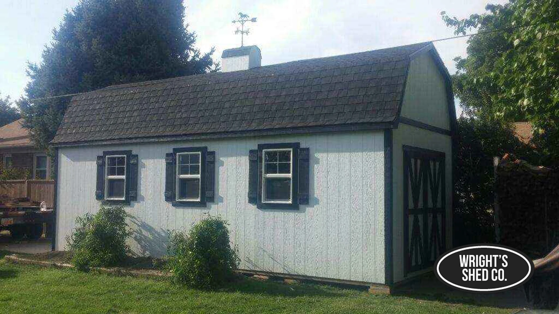 Shed construction materials used in a farm style backyard shed with siding, windows, and durable roofing designed for long lasting outdoor storage