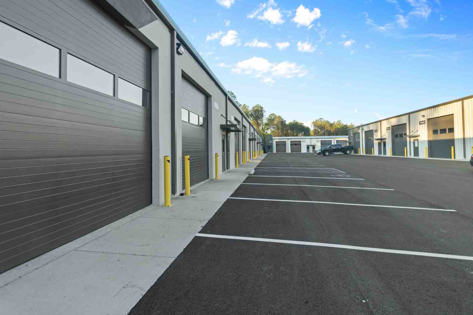 large roll-up garage door on a commercial unit - Microflex Space for Christmas Lighting Businesses