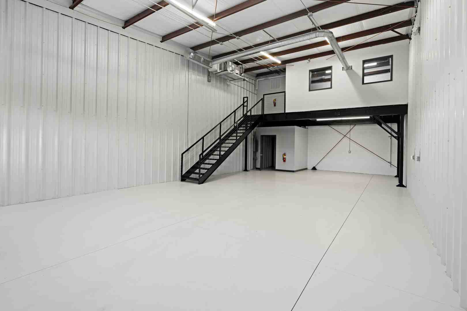 Unit customized with an office and loft - MicroFlex Spaces for Businesses in Hoover