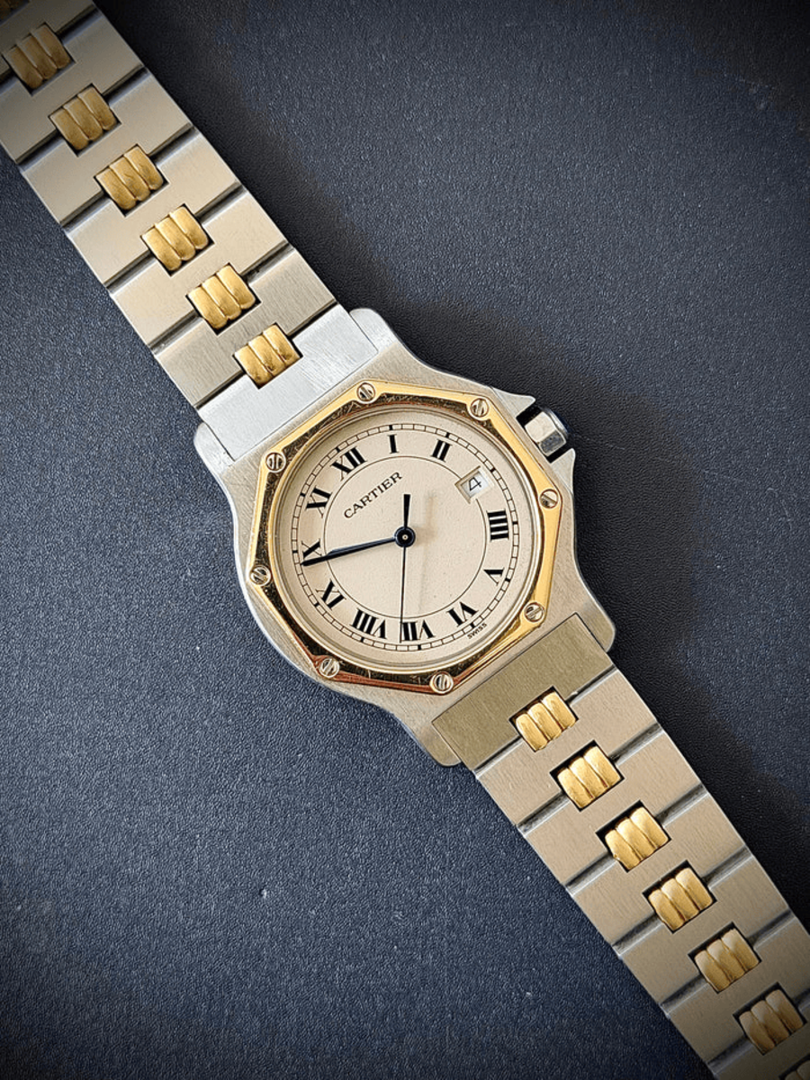 1990s Cartier Santos Octagon Stainless Steel with 18k Yellow Gold Bezel Screws 1990s Cartier Santos Octagon Stainless Steel with 18k Yellow Gold Bezel Screws