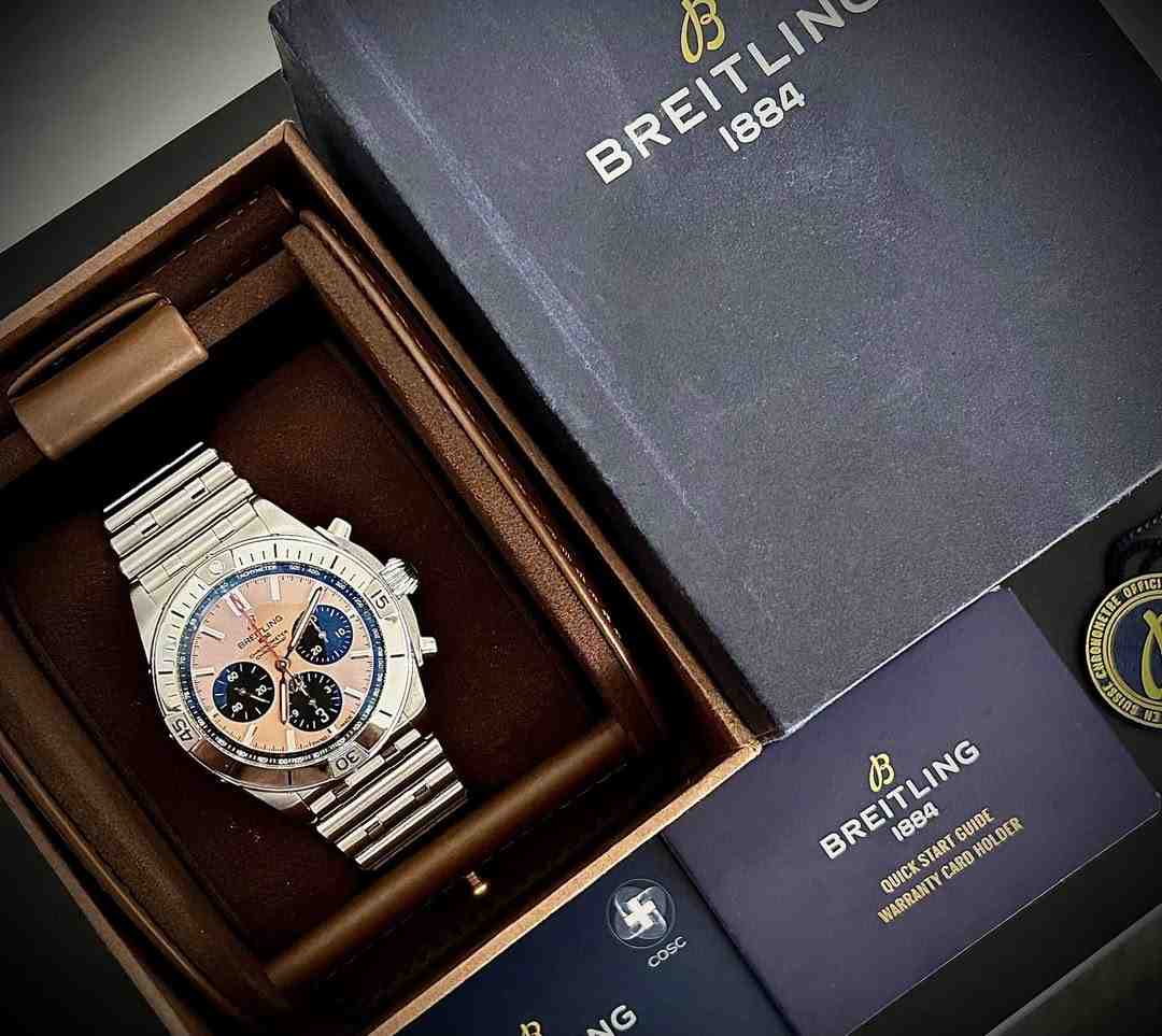 A Breitling watch in a box.