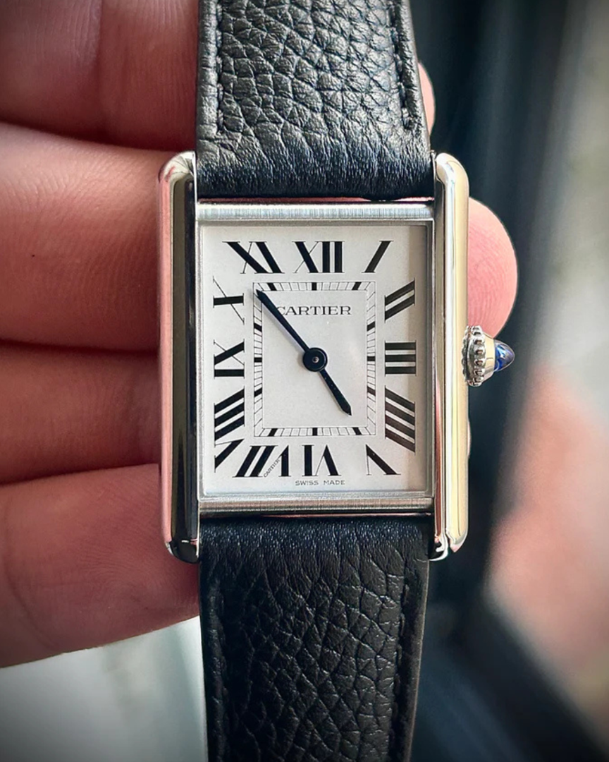 2023 Cartier Tank Must Quartz Large, held in hand. 2023 Cartier Tank Must Quartz Large, held in hand.