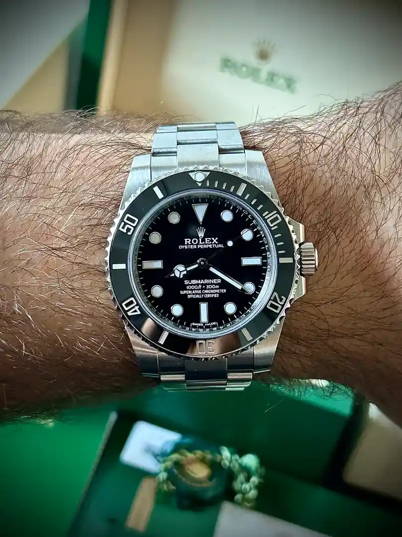 user-inserted Rolex Submariner on wrist