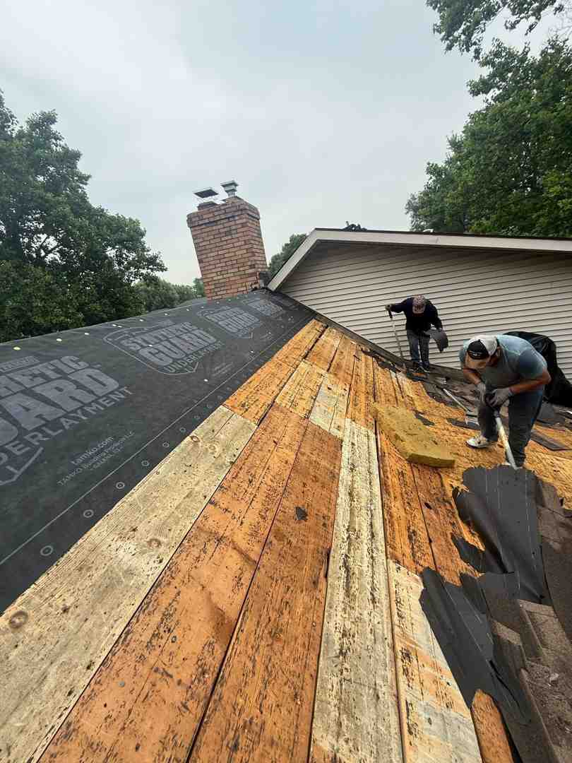 Roofing team working on a residential roof replacement in Bellefontaine, Ohio - Roofing company bellafontaine, ohio