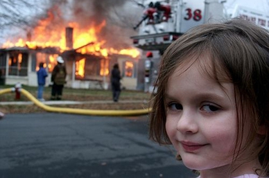 Smirking child in front of a house fire meme template