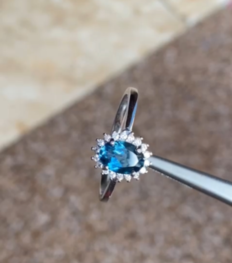 Teal Sapphire Halo Ring - Image 1