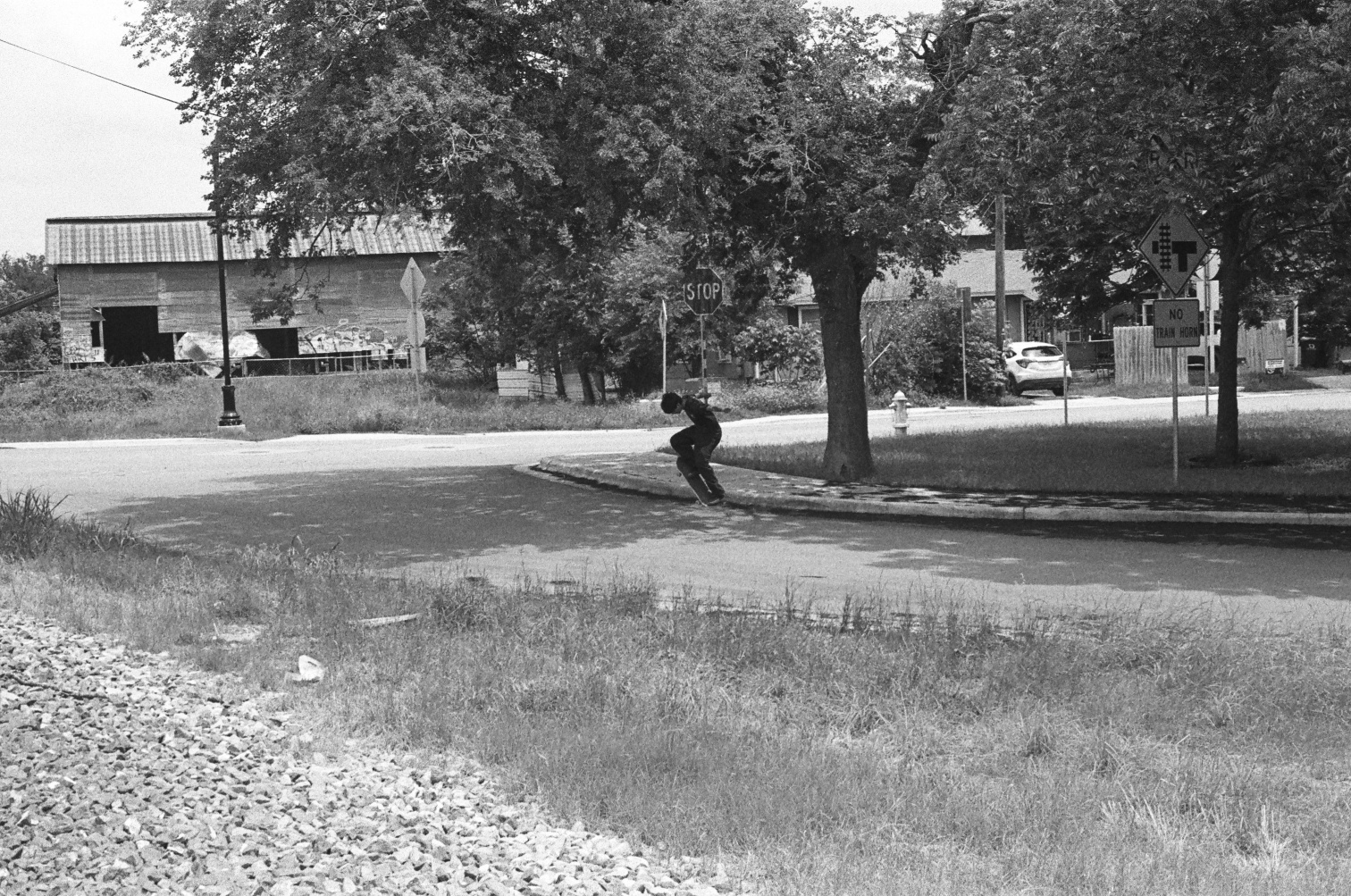 Boy pops an ollie.