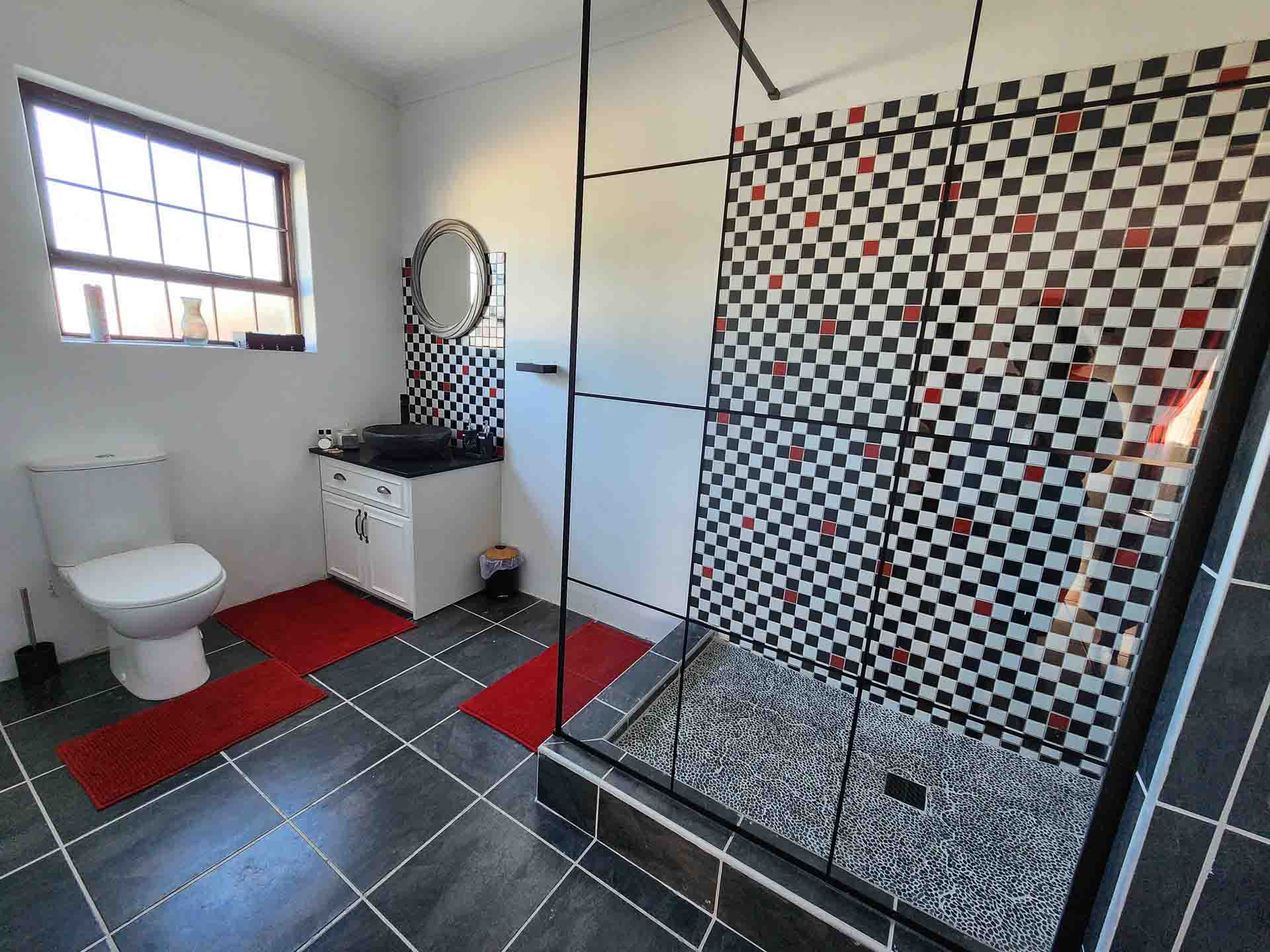 Lighthouse Suite Bathroom - Funky bathroom, styled with inspiration from the lighthouse at Cape Recife