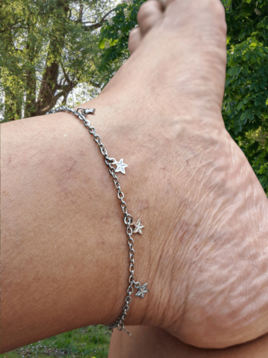 Foto de tornozeleira mini estrelas aço inox