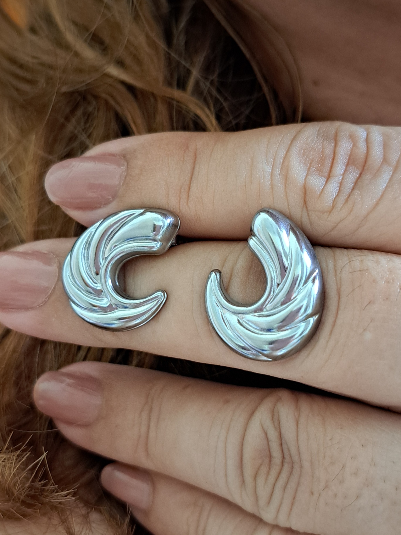 Foto de brinco ondas em aço inox Foto de brinco ondas em aço inox