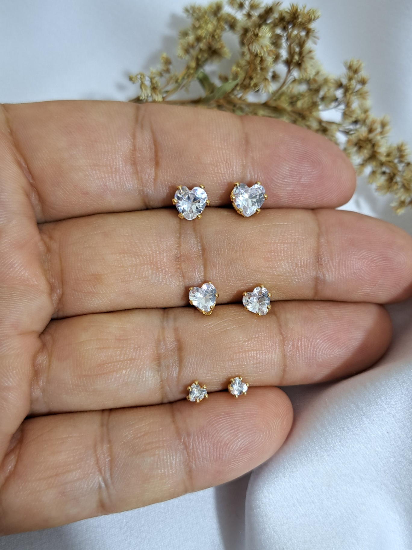 Foto de trio brinco ponto luz coração cristal