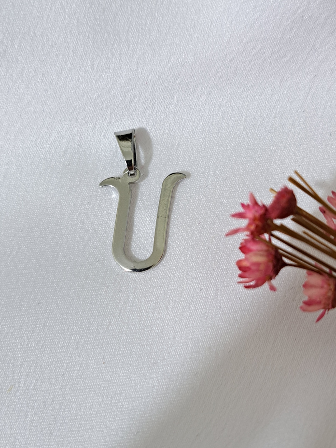Foto de pingente letras cursivas em aço inox