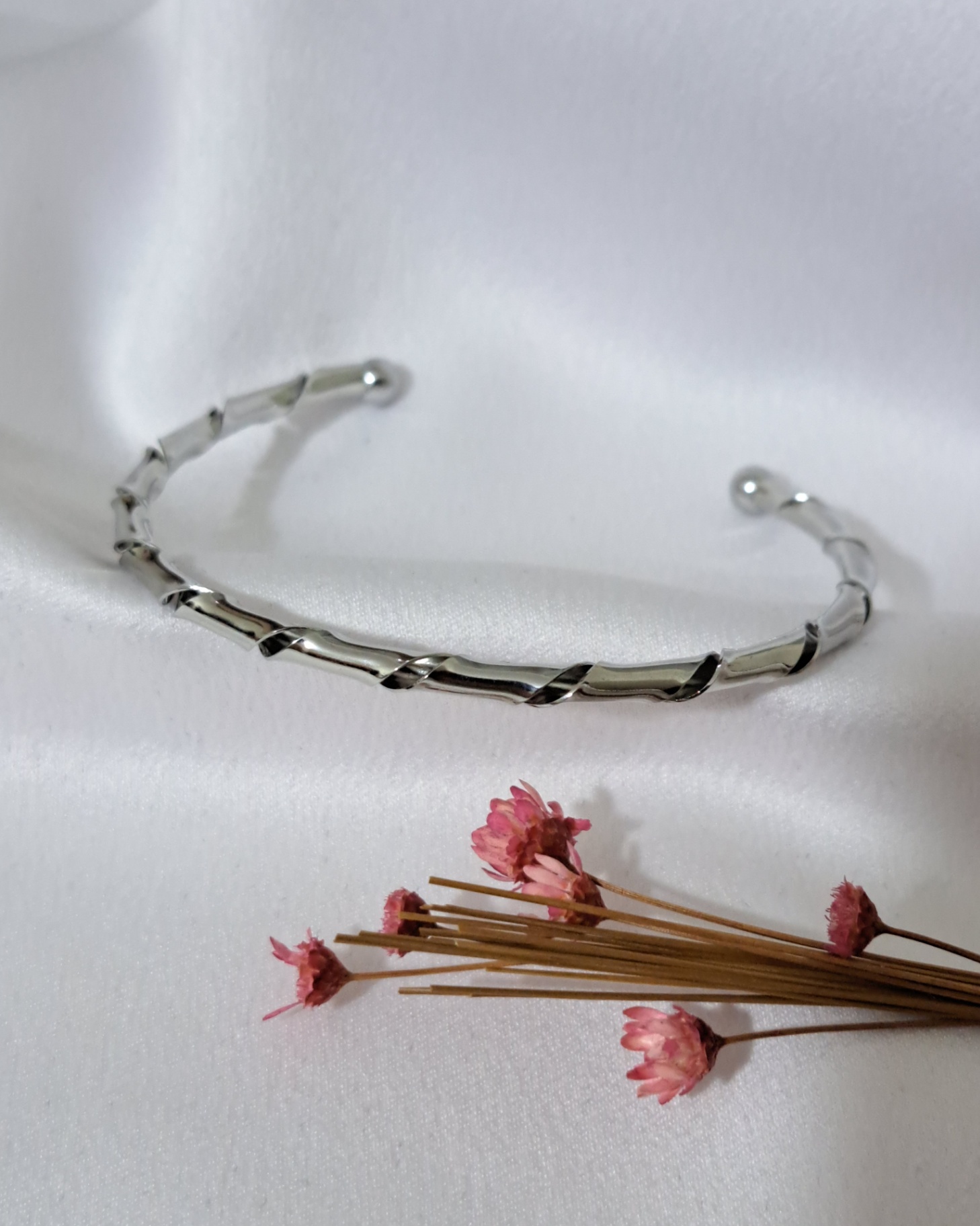 Foto de pulseira bracelete torcido em aço inox