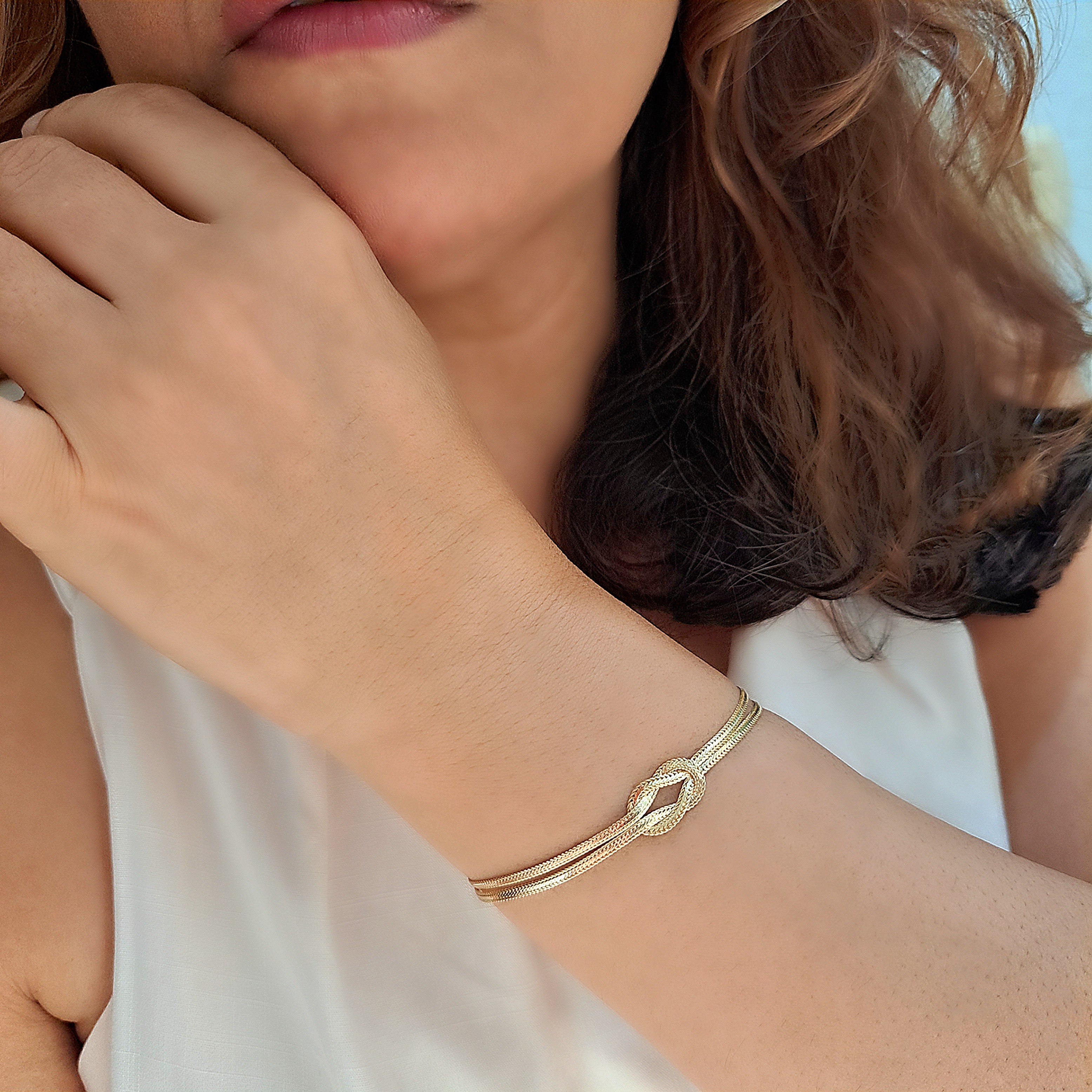Foto de pulseira dois fios com um nó