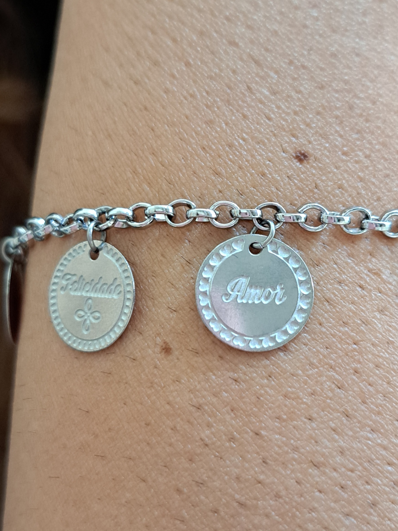 Foto de pulseira medalhas positivas em aço inox