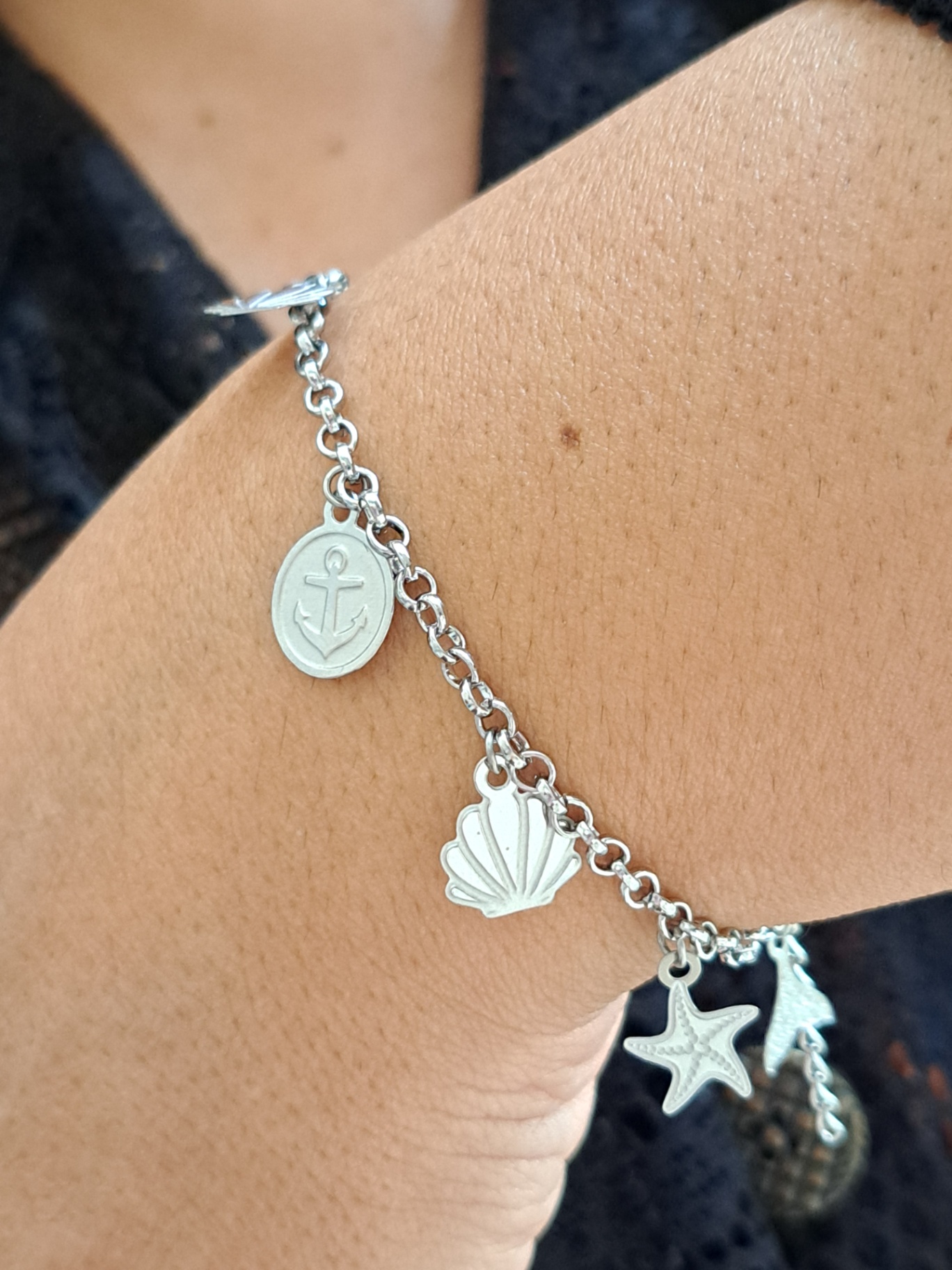 Foto de pulseira oceano 7 pingentes em aço inox