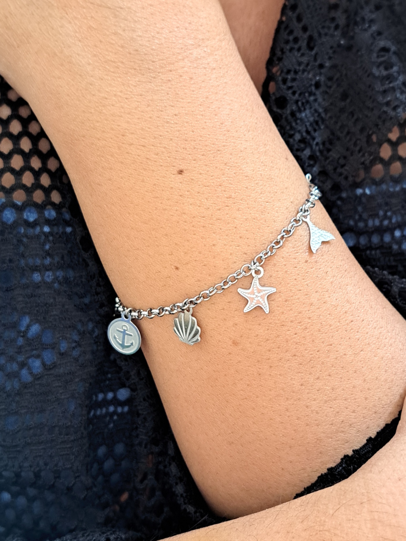 Foto de pulseira oceano 7 pingentes em aço inox