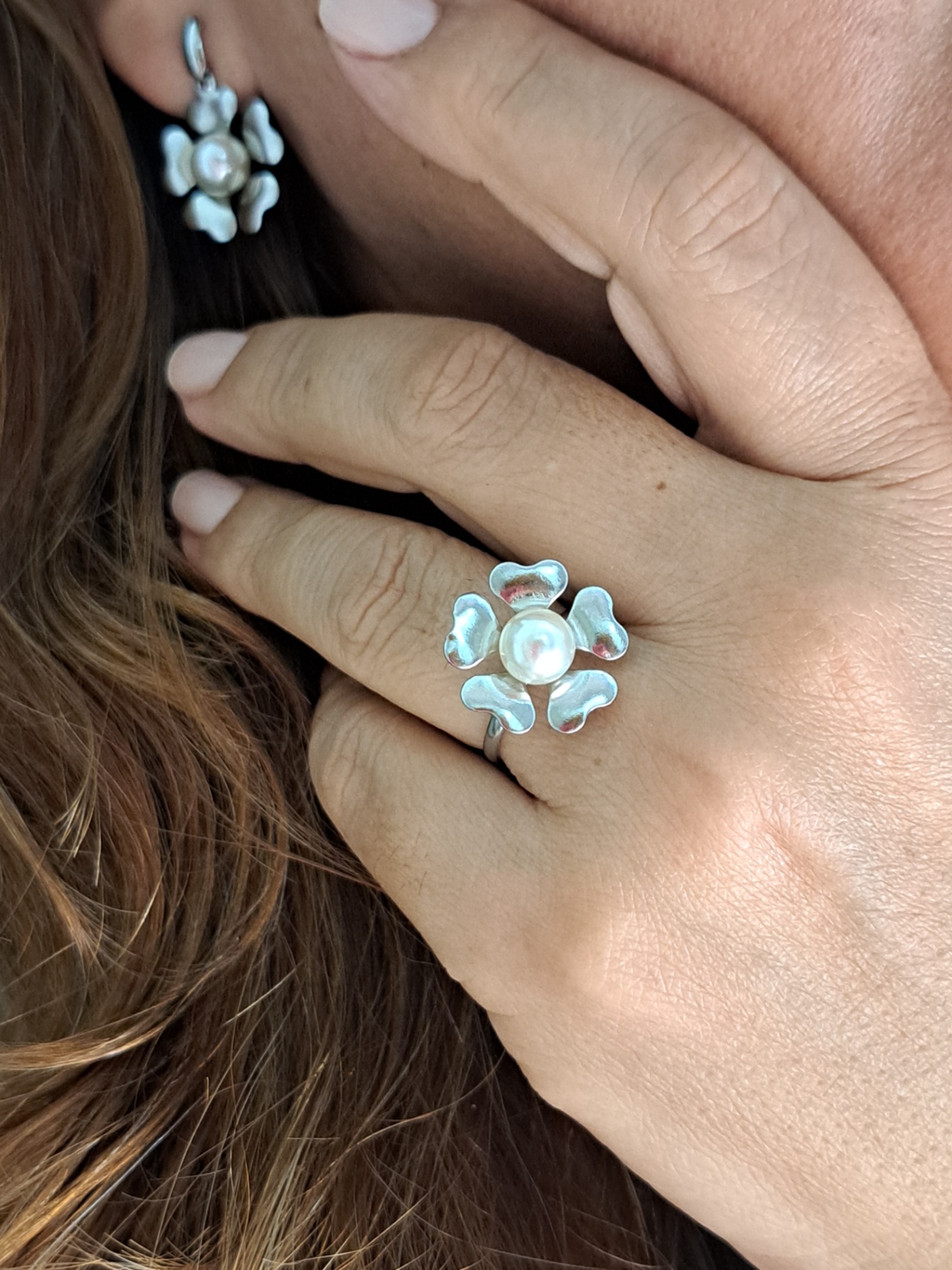 Foto de anel flor com uma pérola aço inox