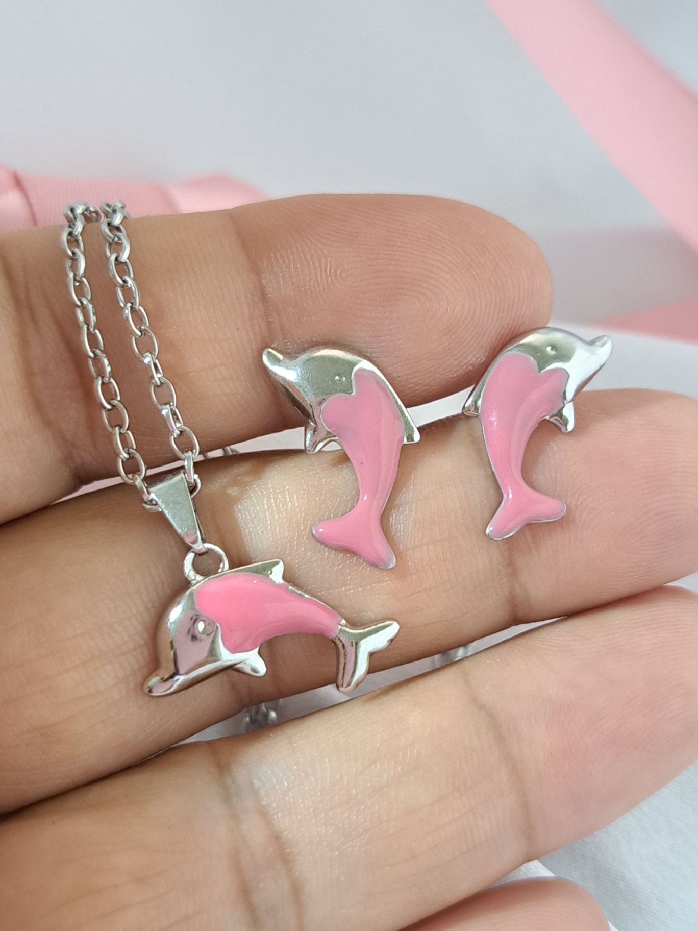 Foto de conjunto golfinho resinado em aço