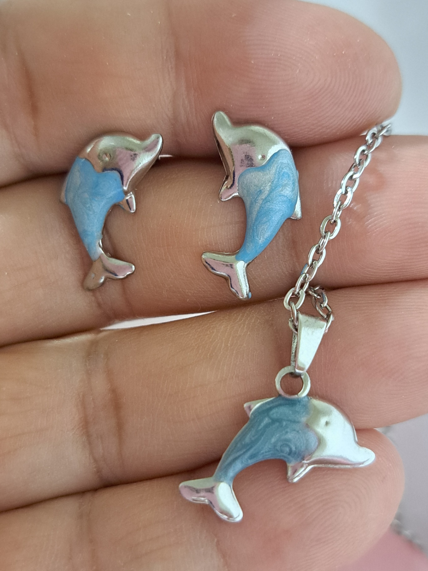 Foto de conjunto golfinho resinado em aço