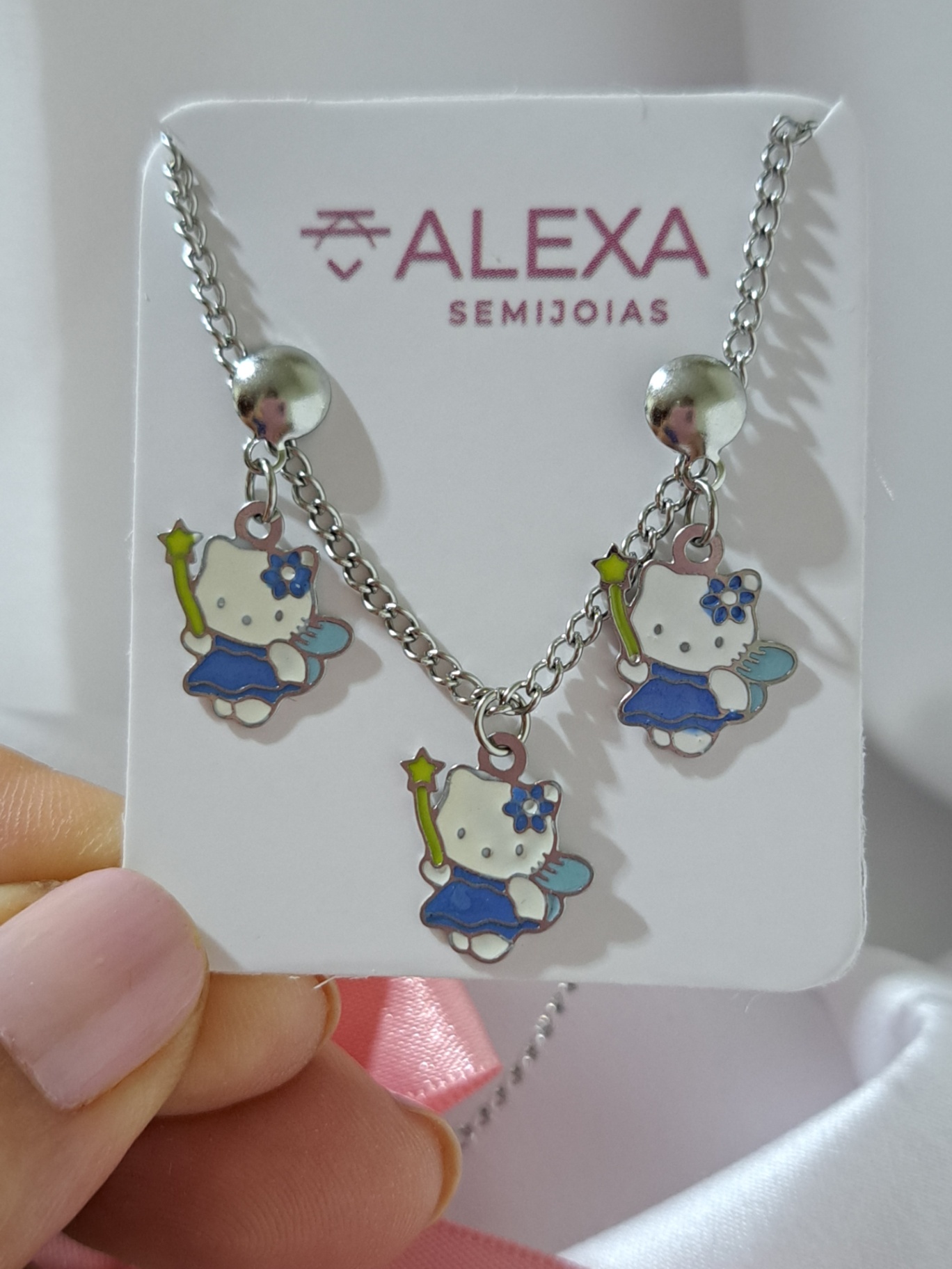 Foto de conjunto resinado hello kitty em aço inox