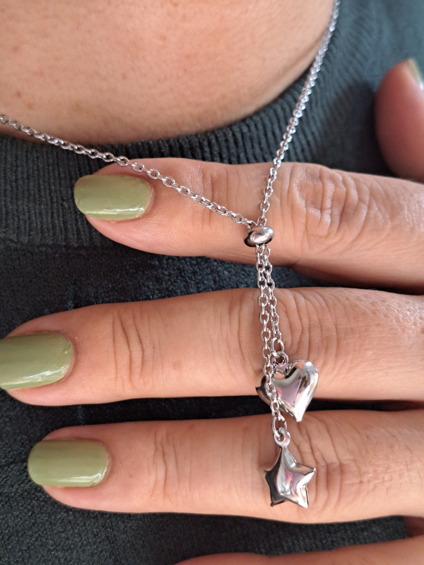 Foto de colar gravatinha coração e estrela aço inox