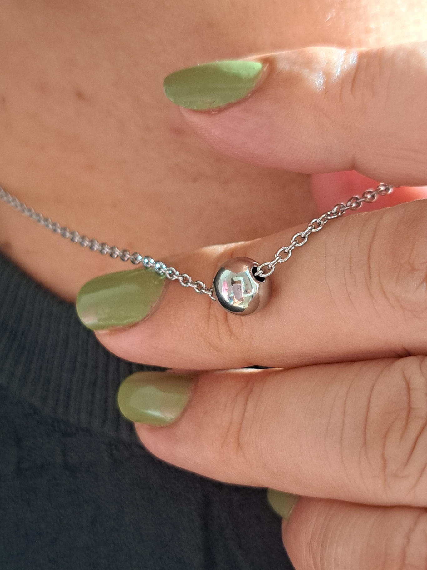 Foto de colar uma esfera em aço inox