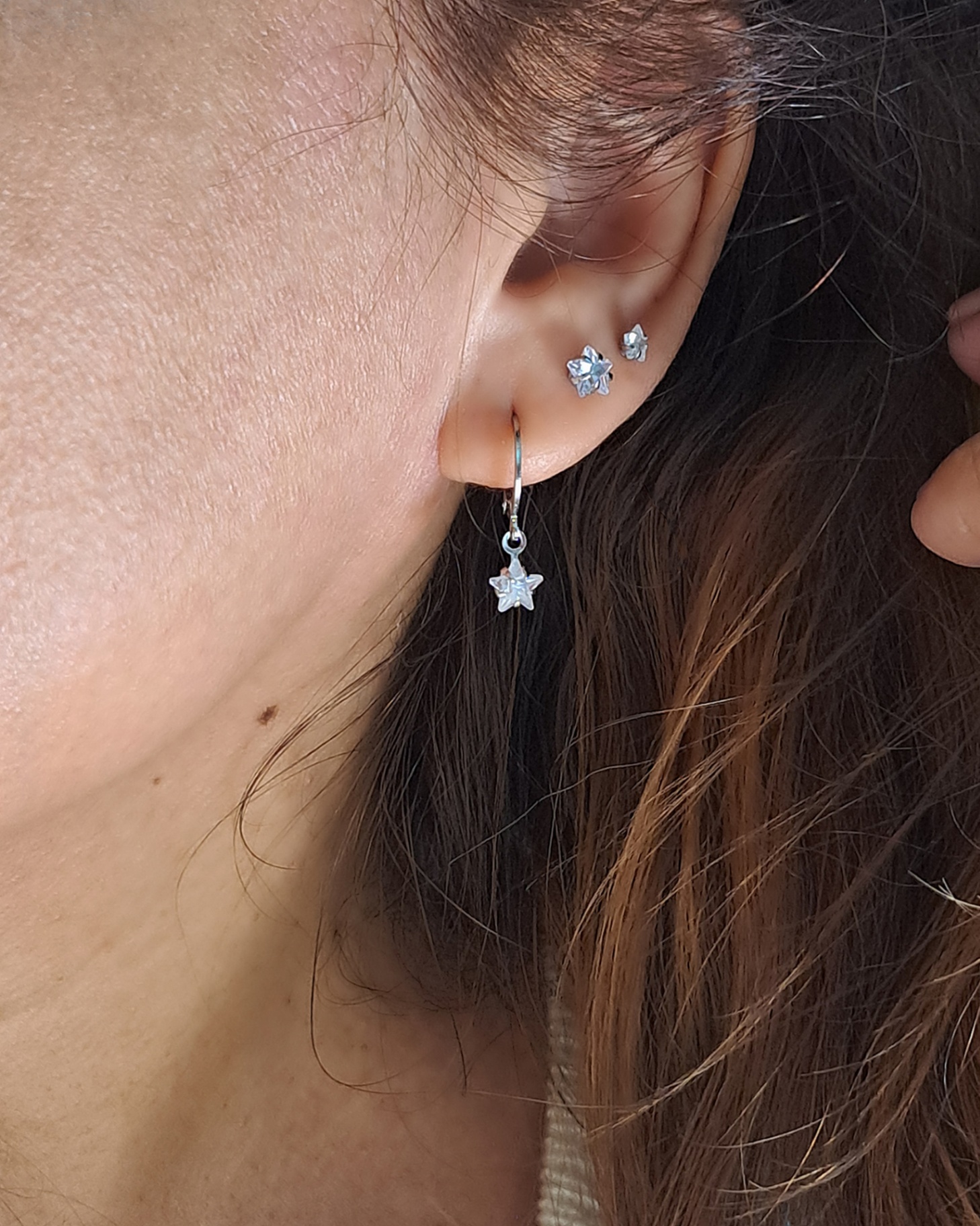 Foto de trio de brincos com pedra estrela aço inox