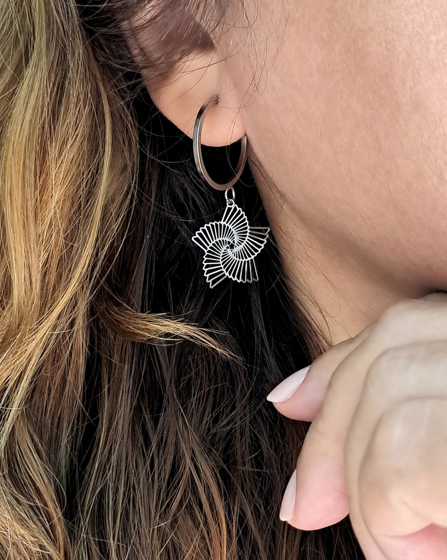 Foto de argola estrela espiral em aço inox