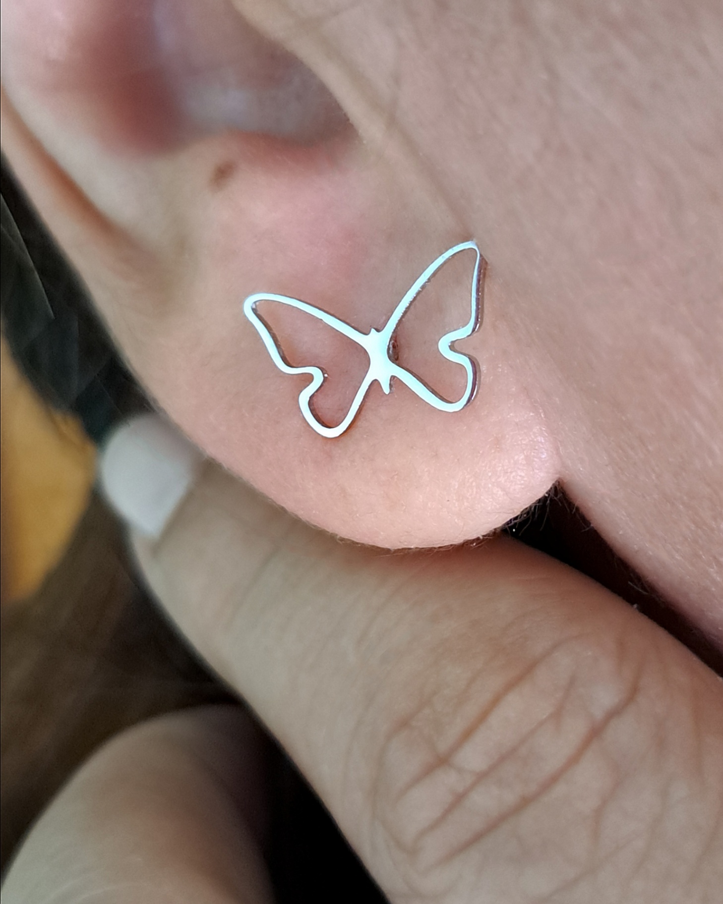 Foto de brinco borboleta vazada g em aço inox