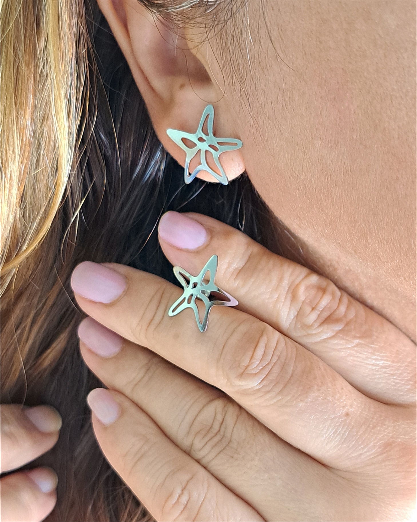 Foto de brinco estrela do mar vazada aço inox Foto de brinco estrela do mar vazada aço inox