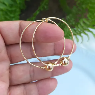 Foto de argola com uma esfera de 9mm