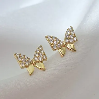 Foto de brinco lacinho m com microzircônia