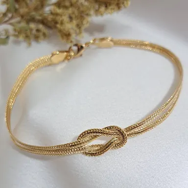 Foto de pulseira dois fios com um nó